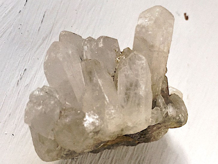 Klar quartz on white surface