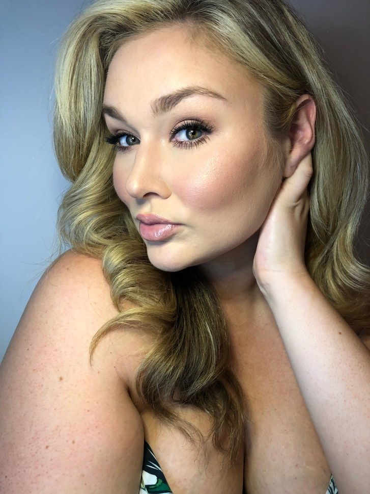 en picture of Hunter McGrady with her hair behind her ear