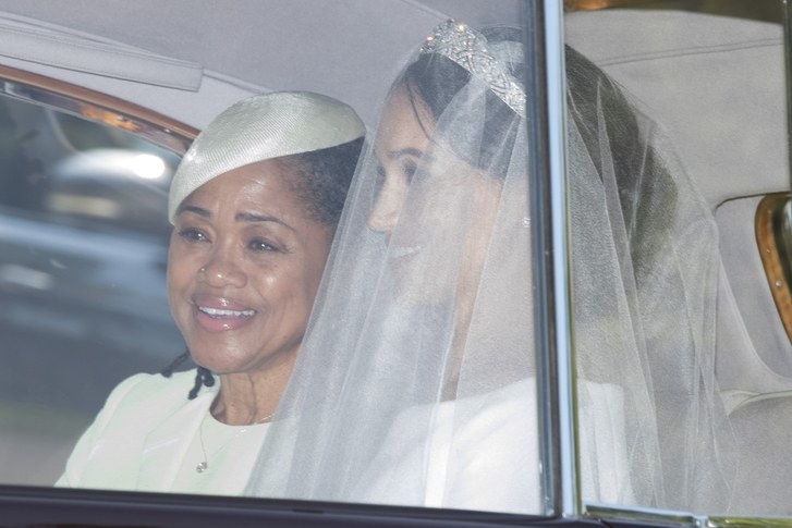 Meghan Markle and her mother Doria Ragland make their way to St George's Chapel at Windsor Castle before the wedding of Prince Harry to Meghan Markle on May 19, 2023 in Windsor, England. 