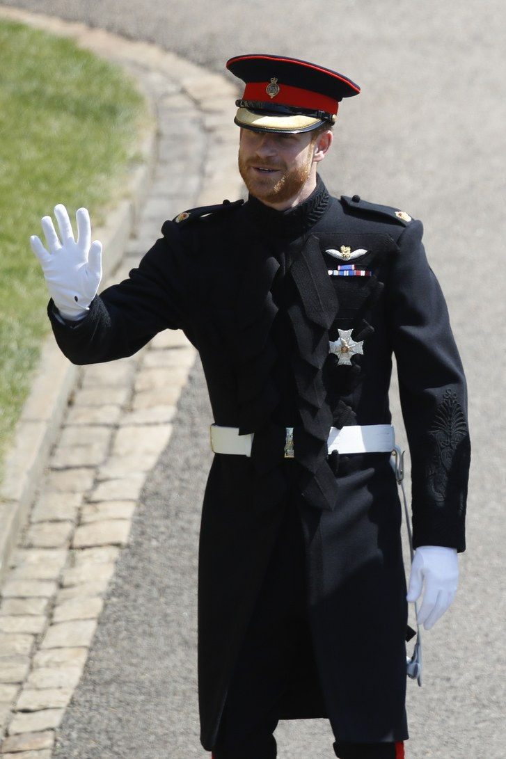 Принце Harry arrives for the wedding ceremony with Meghan Markle at St George's Chapel, Windsor Castle on May 19, 2018 in Windsor, England. 