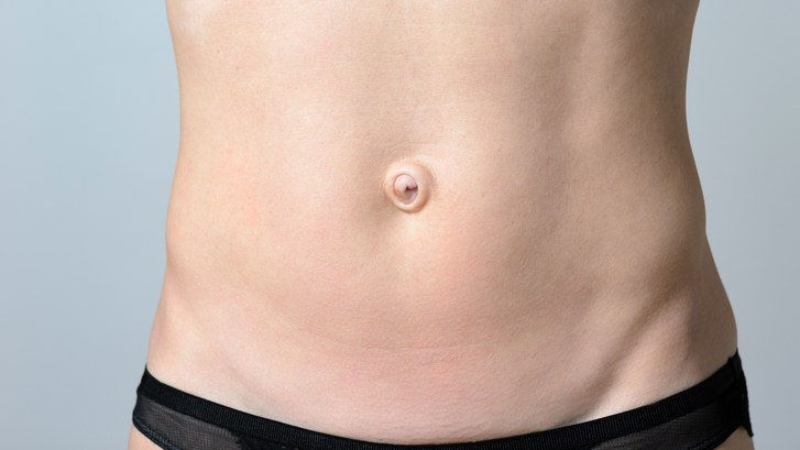 Närbild shot of belly button