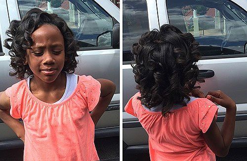 krátky curled black hairstyle for a little girl