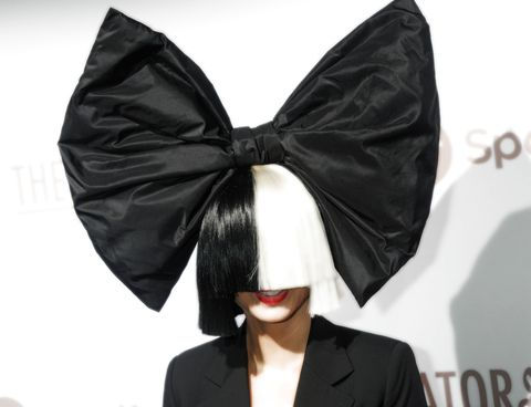 sia wearing a black-and-white wig.