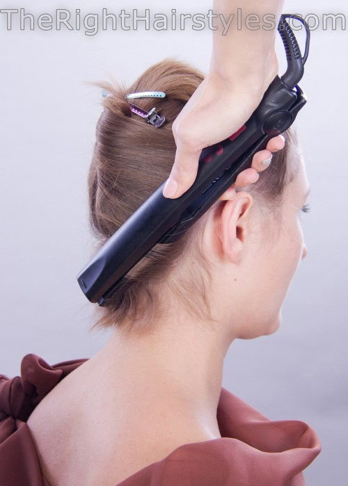 curling hair with a flat iron