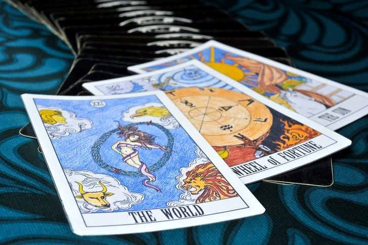 tarot Cards: The World, The Wheel of Fortune, and The Sun