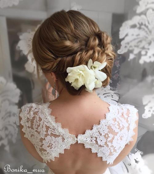 Bridal Updo With Twists And Flowers